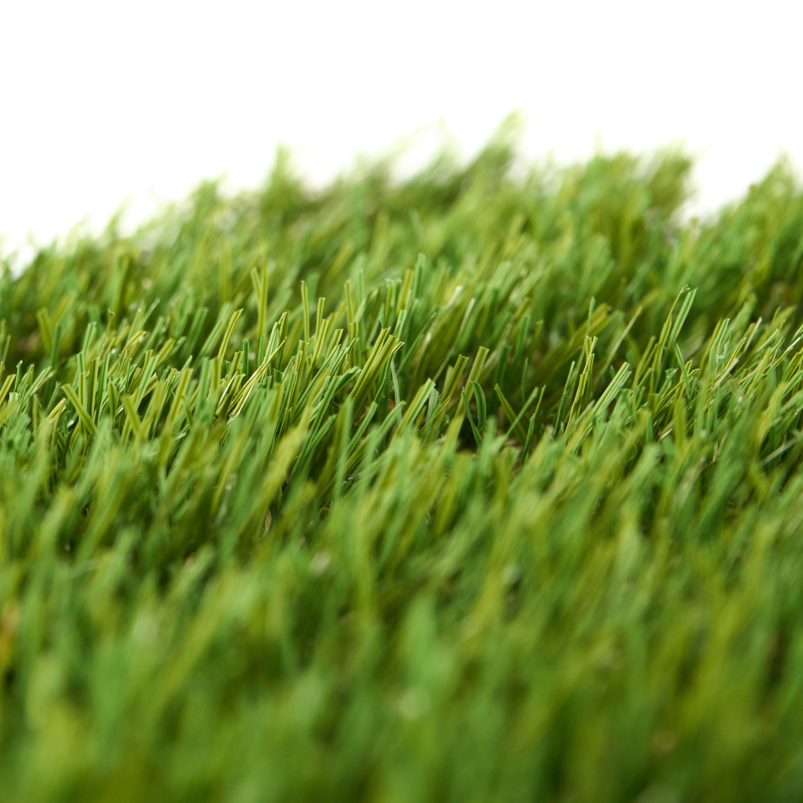 Premium artificial grass backyard installation with modern pool and luxury outdoor living space in Canada